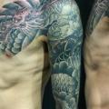 tatuaggio Braccio Giapponesi Draghi di Inkholic Tattoo