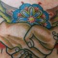 Hands tattoo by Sunrat Tattoo