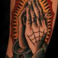 Arm Old School Praying Hands tattoo by Seoul Ink Tattoo