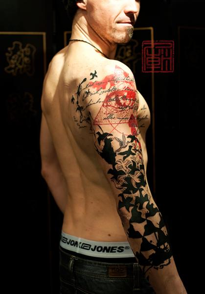 Tatuaggio Braccio Illusione Ottica di Tattoo Temple