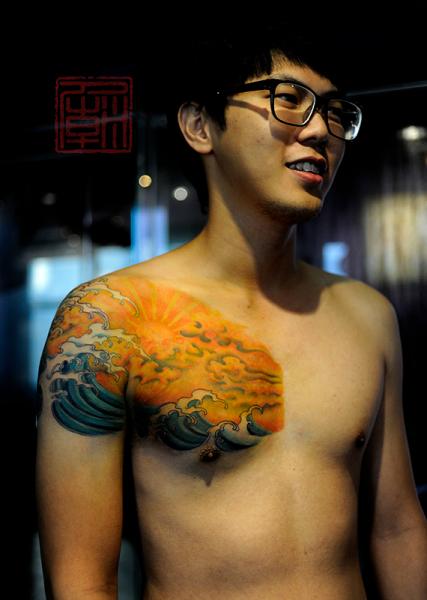 Shoulder Japanese Wave Sun Tattoo by Tattoo Temple