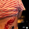 tatuaggio Fianco Scritte Pesce di Tattoo Temple
