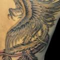 Side Phoenix tattoo by Detroit Diesel Tattoo