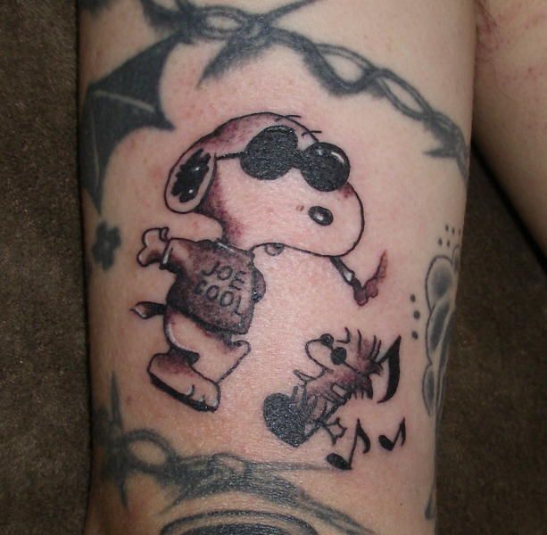 Arm Snoopy Tattoo von Koji Tattoo