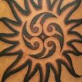 Shoulder Tribal Sun tattoo by M Crow Tattoo