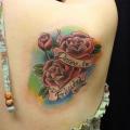 Blumen Leuchtturm Rücken tattoo von South Dragon Tattoo