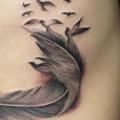 Feather Side tattoo by Maceio Tattoo