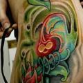 Fantasy Flower Side tattoo by Maceio Tattoo