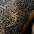 Shoulder Phoenix tattoo by Wizdom Tattoo