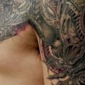 Shoulder Biomechanical Chest tattoo by Wizdom Tattoo