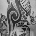 tatuaggio Fianco Tribali Rana di Prive Tattoo