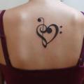 Herz Rücken Musik tattoo von Tattoo Stingray
