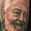 tatuaje Brazo Realista Padre Pio por Tattoo Zoo
