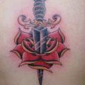 Flower Back Dagger tattoo by Tattoo Zoo