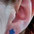 Star Head Ear tattoo by Rainfire Tattoo