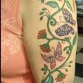 Shoulder Flower tattoo by Rainfire Tattoo