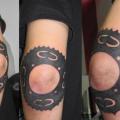 tatuaje Brazo Engranaje Tribal por Shogun Tats