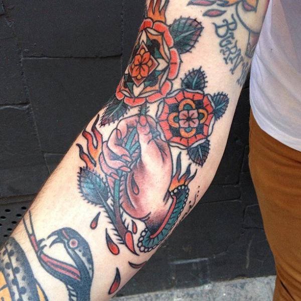 Arm Old School Flower Hand Tattoo by Carnivale Tattoo