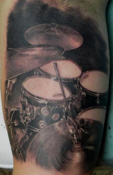 Arm Realistic Drum Tattoo by Xavi Tattoo