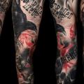 tatuaggio Braccio Scritte Corvo di Buena Vista Tattoo Club