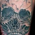tatuaggio Braccio Teschio di Seven Arts