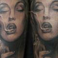 Realistic Calf Women tattoo by Cosa Fina Tattoo