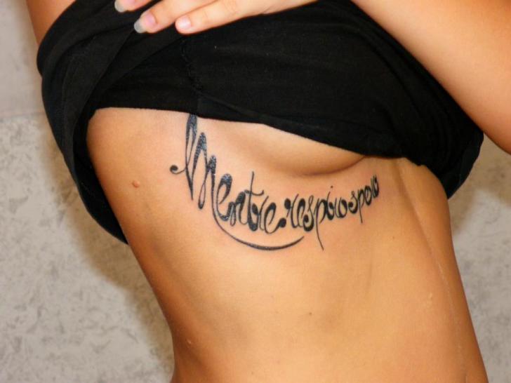 Lettering Breast Tattoo by Cactus Tattoo