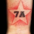 tatouage Bras Étoile par Planeta Tattoo