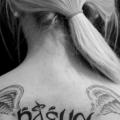 Lettering Back Wings tattoo by Sputnink Tattoo