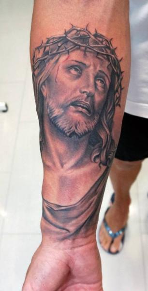 Arm Religious Tattoo by Astin Tattoo