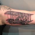 Arm Realistic Airplane tattoo by Silver Needle Tattoo