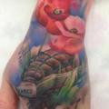 Flower Hand Bomb tattoo by Immortal Ink