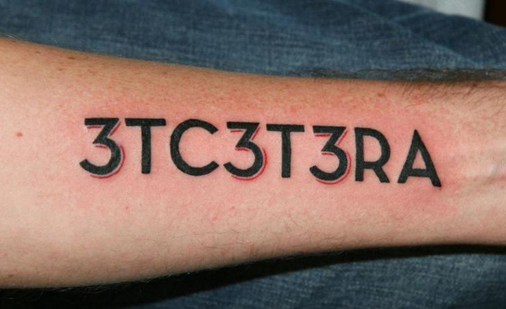 Tatuaggio Braccio Scritte Caratteri di Archive Tattoo