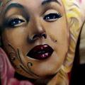 Shoulder Marilyn Monroe tattoo by Oleg Tattoo