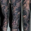 Japanese Dragon Sleeve tattoo by Oleg Turyanskiy