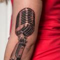 Arm Realistic Microphone tattoo by Wicked Tattoo