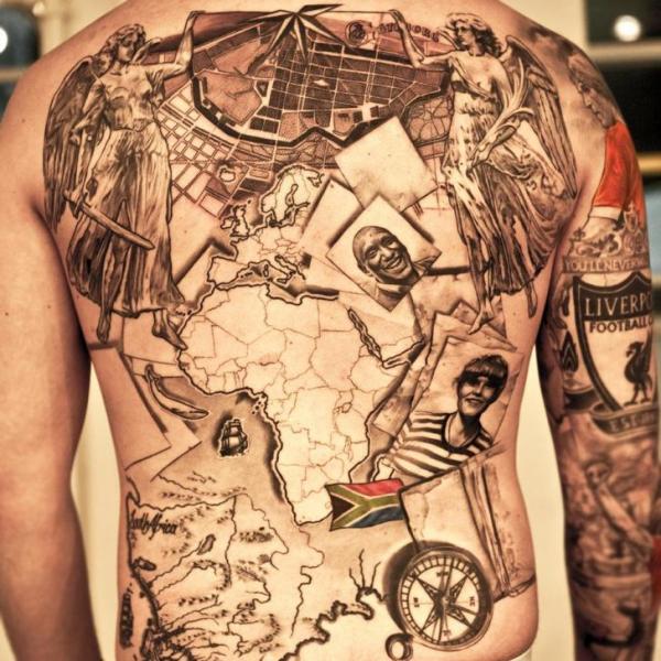 Tatuaje Espalda Mundo por Wicked Tattoo