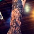 Arm Hand Adler Buch tattoo von Scapegoat Tattoo