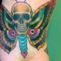 Arm New School Skull Moth tattoo by Pure Vision Tattoo