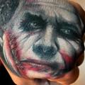 Fantasy Hand Joker tattoo by Pure Vision Tattoo