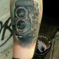 Arm Realistic Camera tattoo by Tattoo Ligans