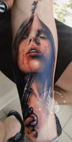 Arm Realistic Women Gun Tattoo by Tattoo Ligans