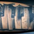 Arm 3d Piano tattoo by Vaso Vasiko Tattoo
