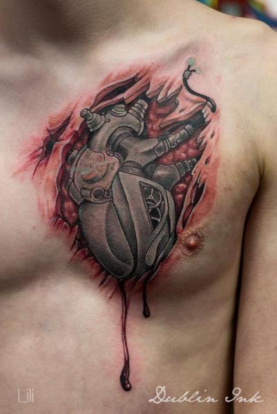 Biomechanical Chest Heart Tattoo by SW Tattoo