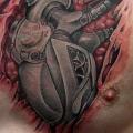 Biomechanical Chest Heart tattoo by SW Tattoo