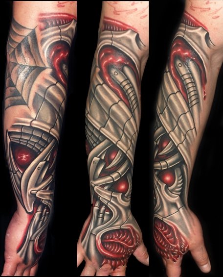 Arm Biomechanical Hand Tattoo by Artistic Element Ink