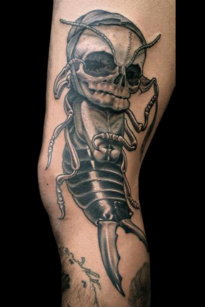 Fantasy Leg Skull Scrabble Tattoo by Spider Monkey Tattoos