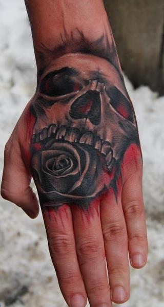 Skull Hand Tattoo by Bio Art Tattoo