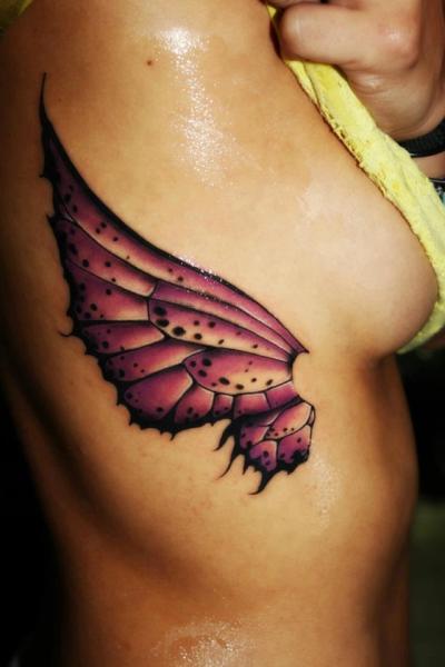 Tatuagem Lado Asas por Proki Tattoo