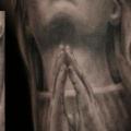 tatuaje Religioso por Chris Gherman